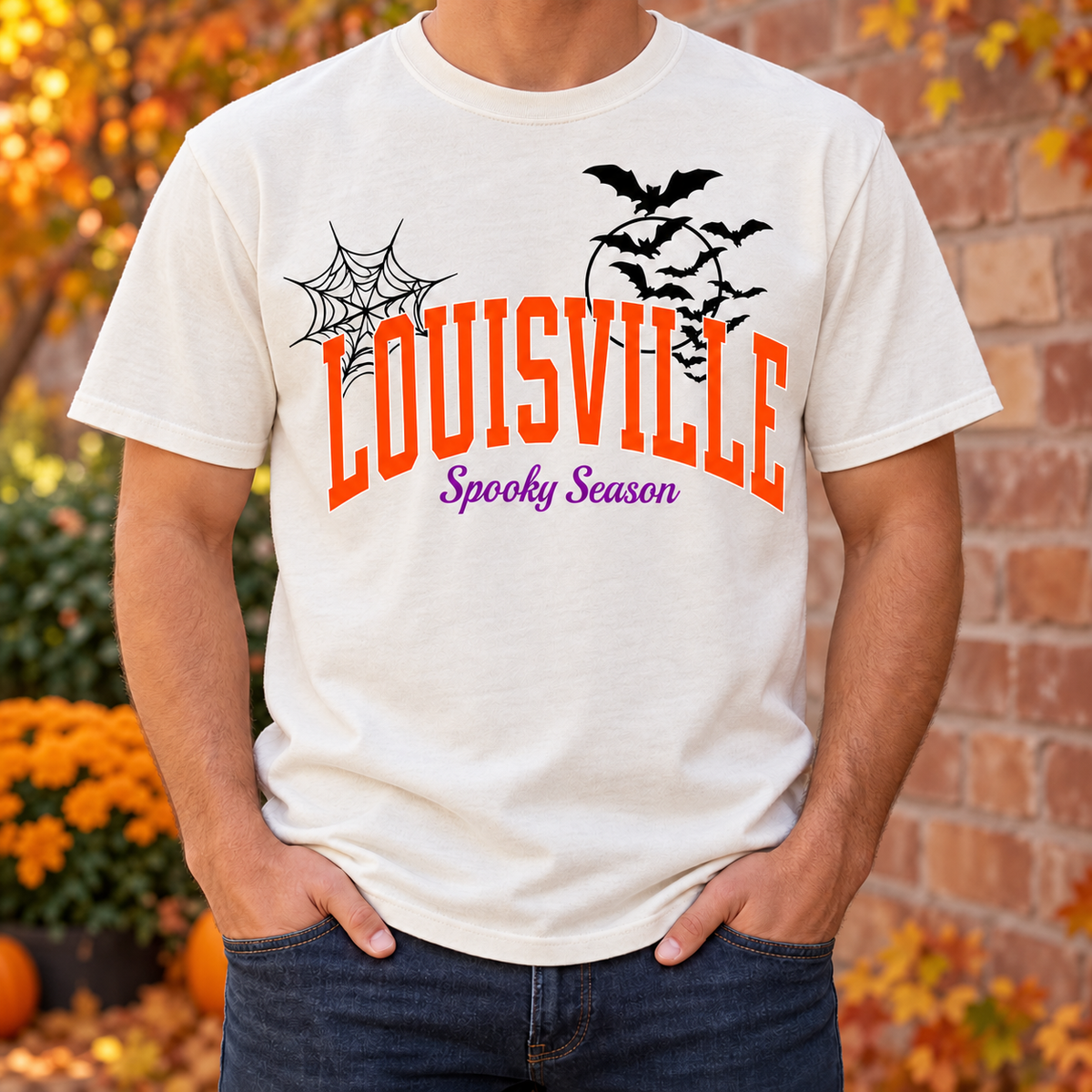 Louisville Spooky Season Comfort Colors tee in Ivory — worn on model outdoors in fall