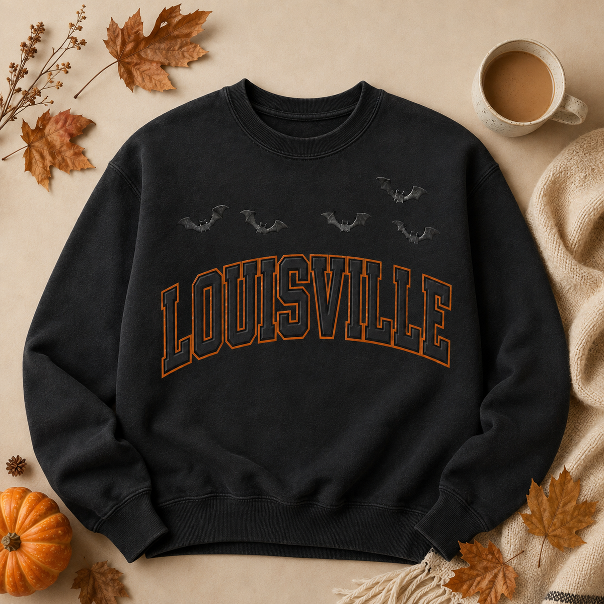 Louisville Halloween blackout crewneck in Black — fall flat lay with autumn leaves, coffee and a knit throw