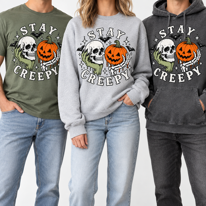 Stay Creepy on models — Olive tee, Heather Grey crewneck and Charcoal hoodie