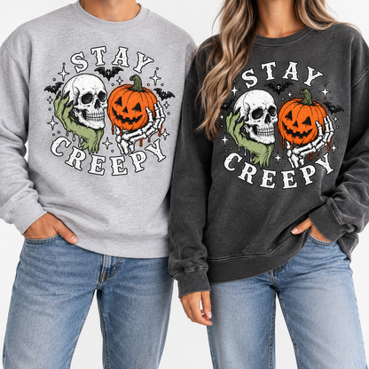Stay Creepy crewnecks in Heather Grey and Charcoal — worn by couple