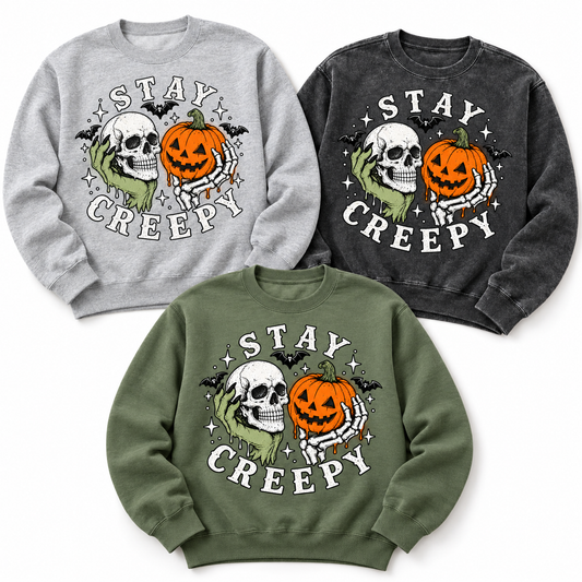 Stay Creepy crewneck sweatshirts in Heather Grey and Charcoal — color lineup