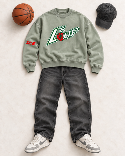 L's Up crewneck sweatshirt in Sage styled with black jeans and grey sneakers — flat lay with basketball and black cap