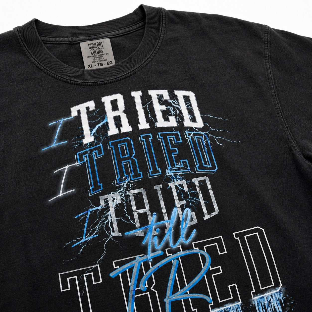 I Tried Till Tired graphic tee — close-up print and fabric detail
