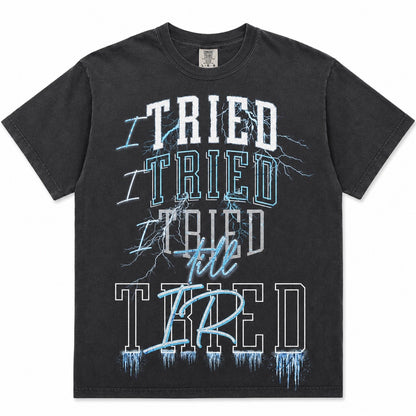 I Tried Till Tired graphic tee — black Comfort Colors flat lay mockup