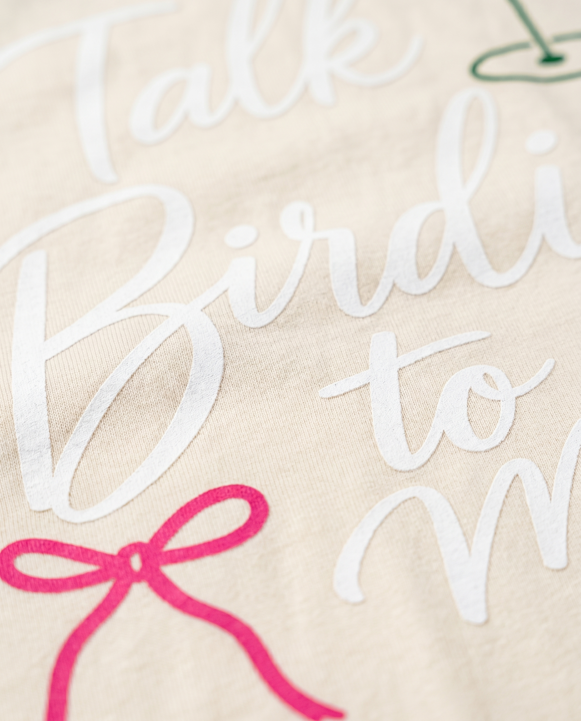 Talk Birdie to Me — detail close-up lettering and bow